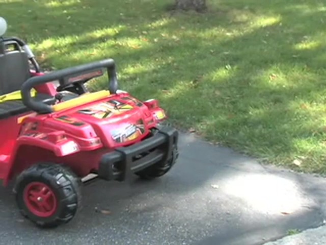 Mighty Wheelz 12V Vehicle Red / Yellow / Black  - image 10 from the video